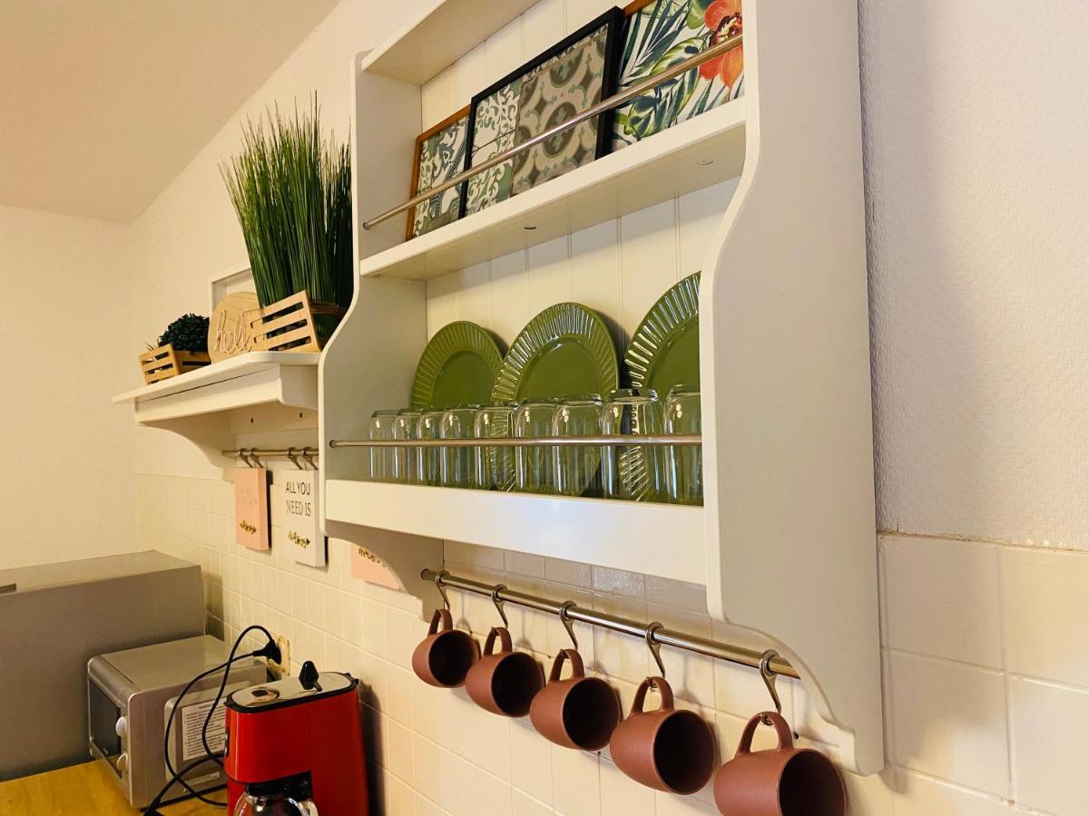 Tm Aparts Dortmund Dış mekan fotoğraf A wall-mounted plate rack